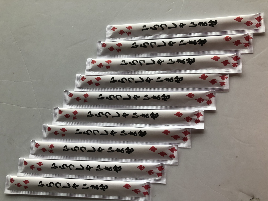 Chopsticks μπαμπού Dispossable ΔΙΔΥΜΩΝ 24CM με το πλήρες έγγραφο που τυλίγεται για τα κινεζικά τρόφιμα