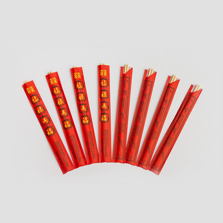 Μίας χρήσης κινεζικά ιαπωνικά Chopsticks μπαμπού με το έγγραφο που τυλίγεται