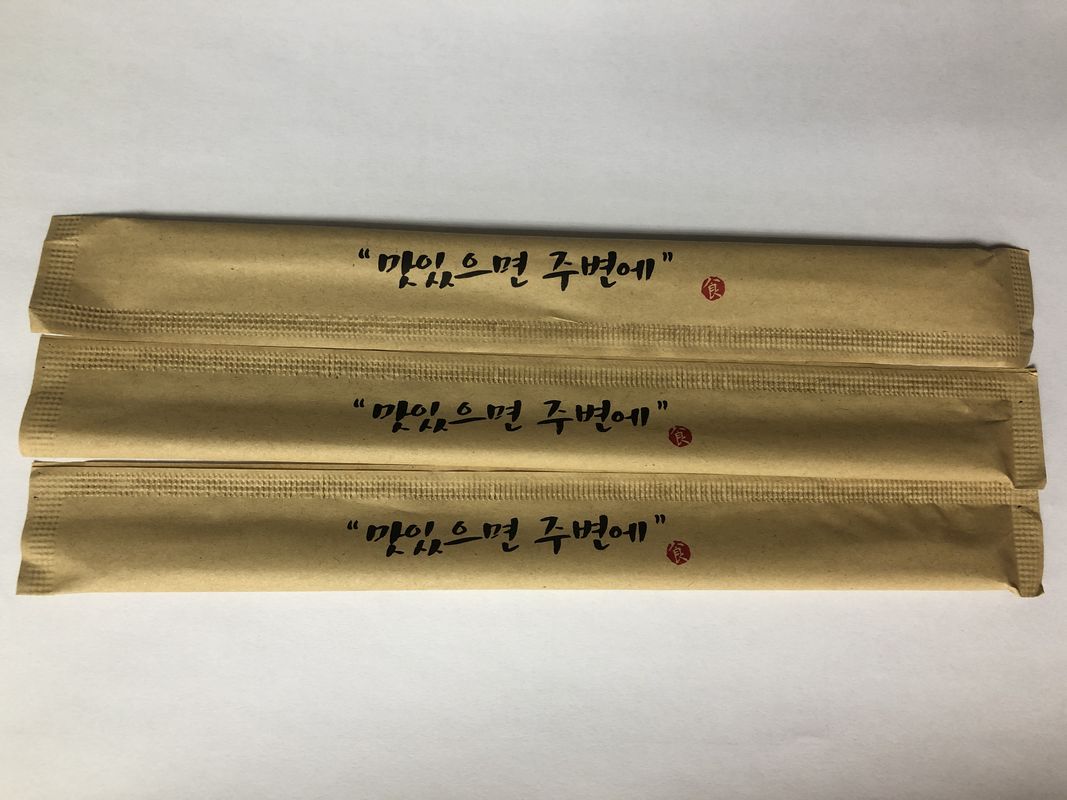 Μίας χρήσης φιλικά Chopsticks Eco μπαμπού με τη συσκευασία εγγράφου της Kraft